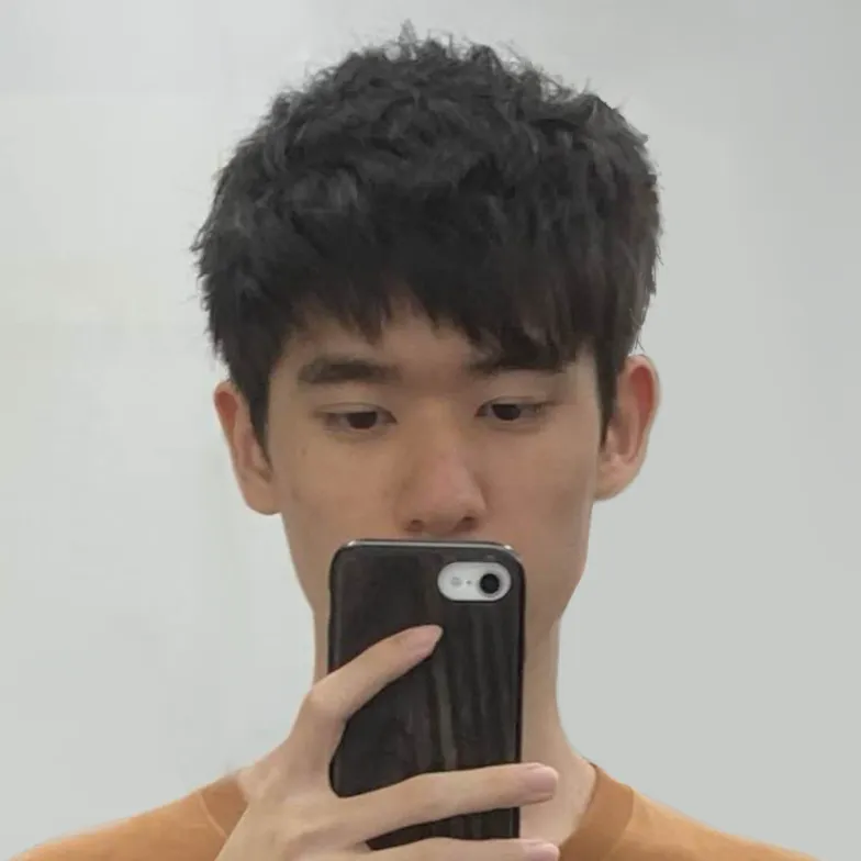 Hsi Chen taking a mirror selfie